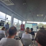 uczestnicy słuchający prelekcji o rewitalizacji w Miejskim Domu Kultury w Łańcucie