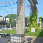 J. Sokołowska-Kowalczyk Fabryka Pełna Życia w Dąbrowie Górniczej - widok na przestrzeń spotkań dla ludzi oraz kawiarnie